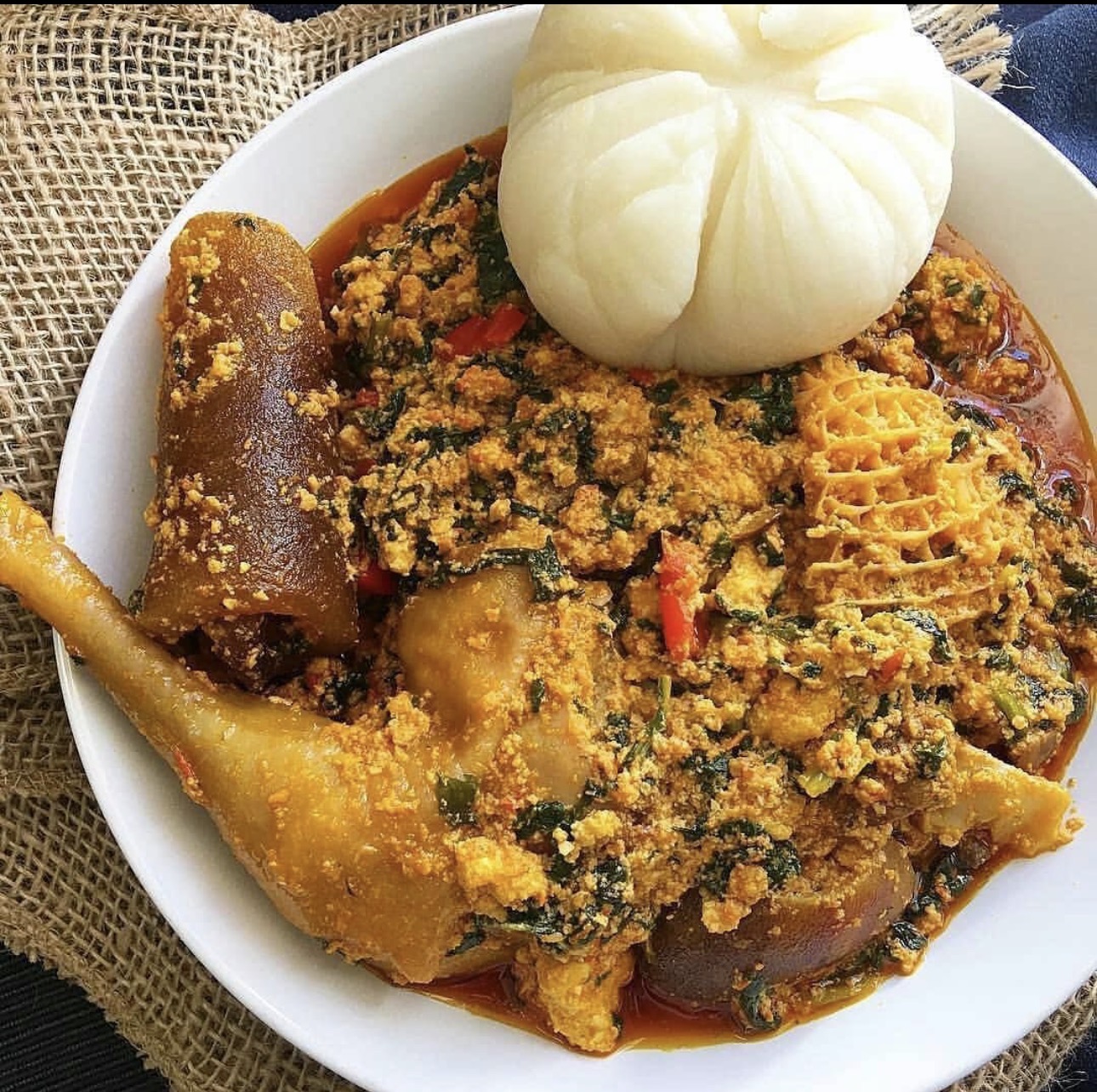 Pounded yam and assorted Nigerian soup served at DE’ Lounge Inn